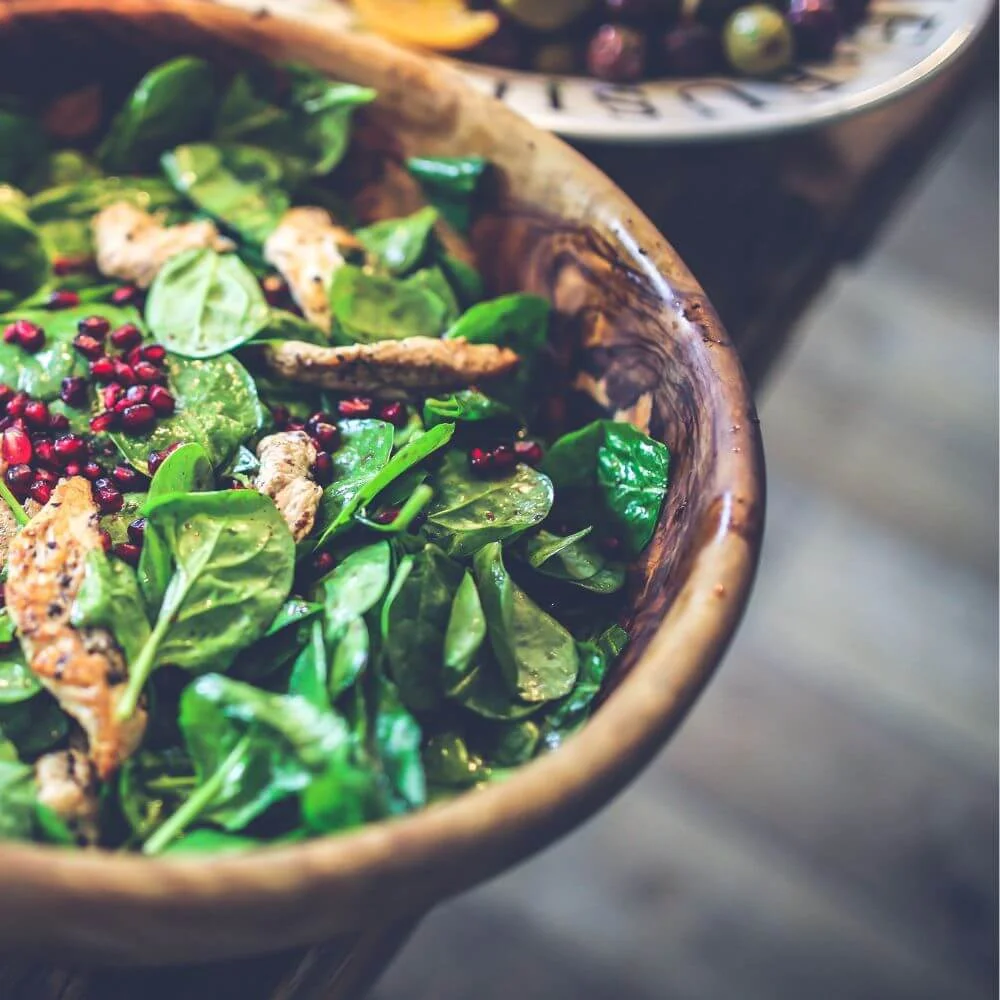 Healthy salad bowl showing foods that may cause digestive issues after 40