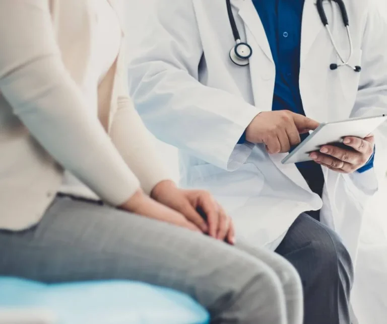 Woman consulting with doctor about pelvic floor health