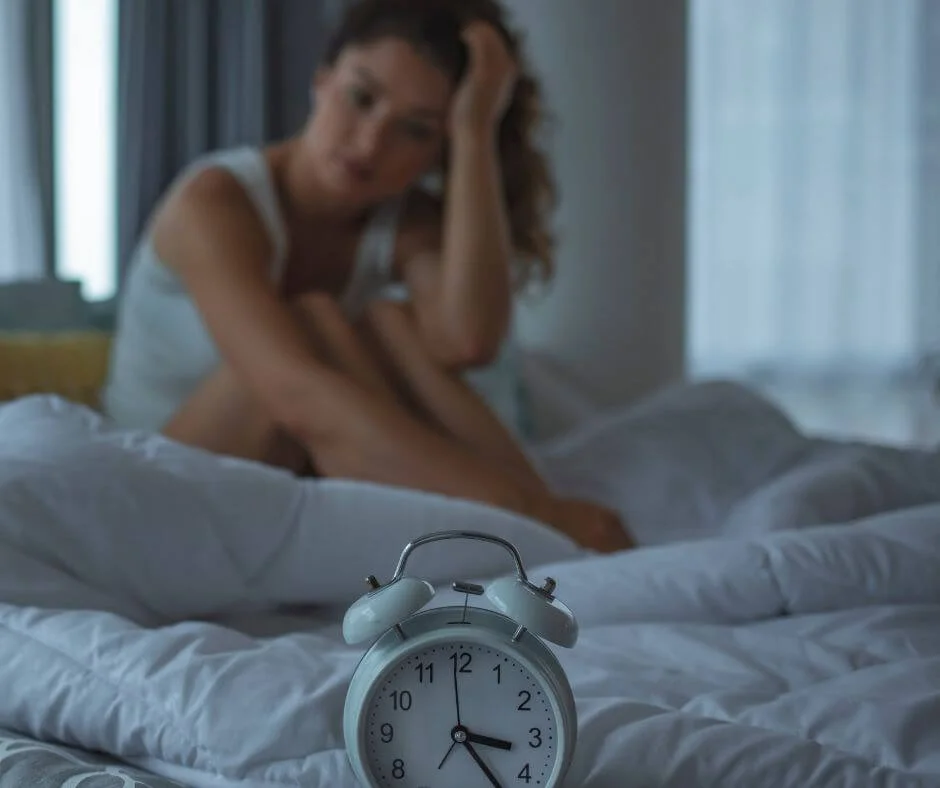 Woman awake at 3 AM unable to fall back asleep due to hormones
